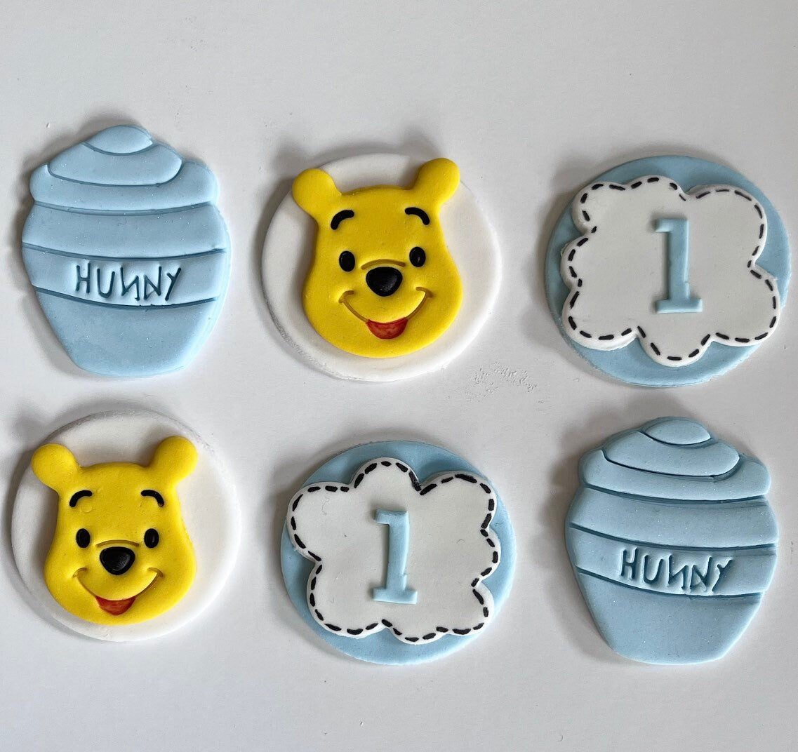 Set of handmade edible sugar Winnie the Pooh bear birthday party cupcake toppers personalised with age